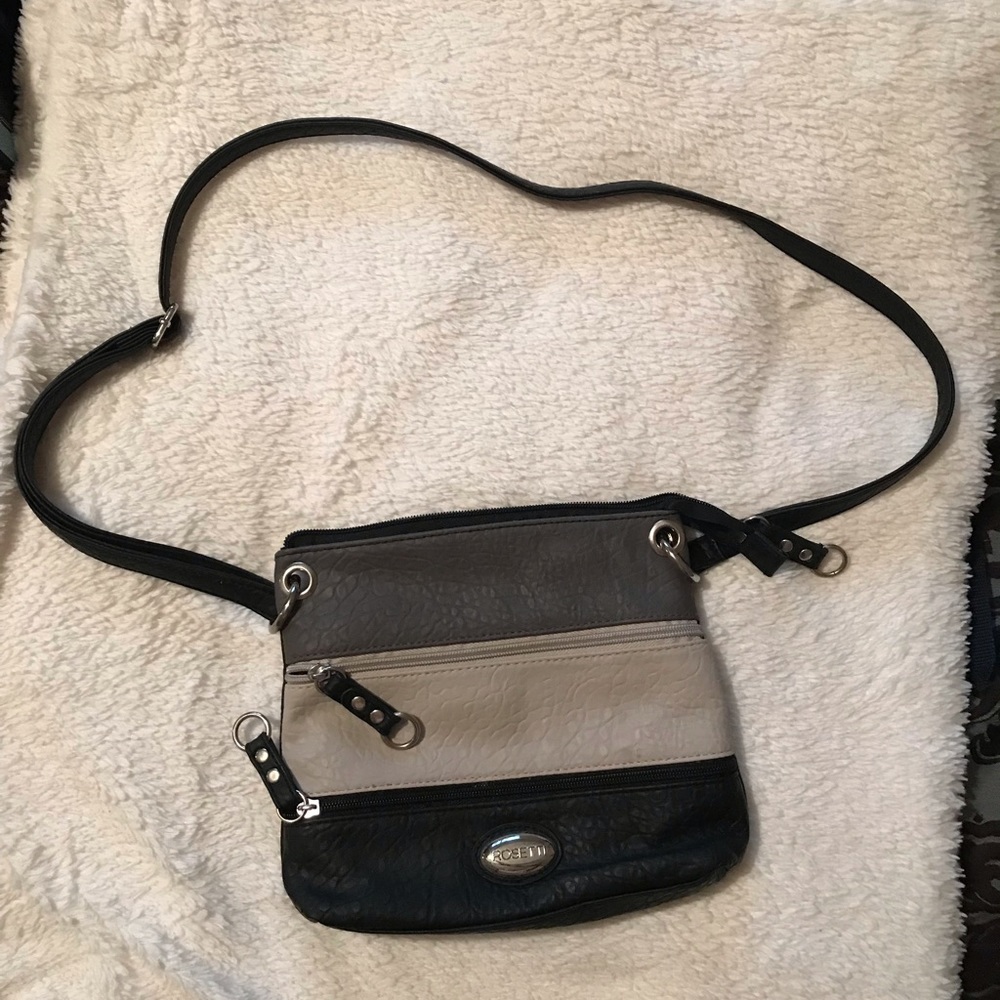 Rosetti purse. Adjustable shoulder strap. Only used a few times.